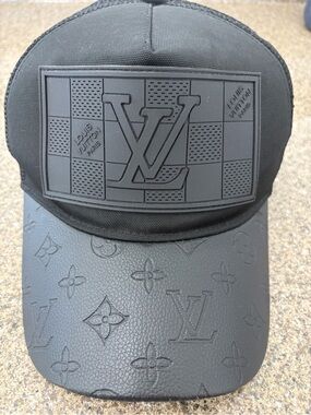 Black Embossed Monogram Patch Cap with Black logo of Louis Vuitton